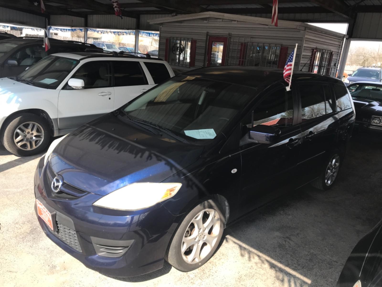 2009 BLUE MAZDA MAZDA5 Grand Touring (JM1CR293790) with an 2.3L L4 DOHC 16V engine, 4-SPEED AUTOMATIC OR 5-SPEED MANUAL transmission, located at 420 E. Kingsbury St., Seguin, TX, 78155, (830) 401-0495, 29.581060, -97.961647 - Photo #0