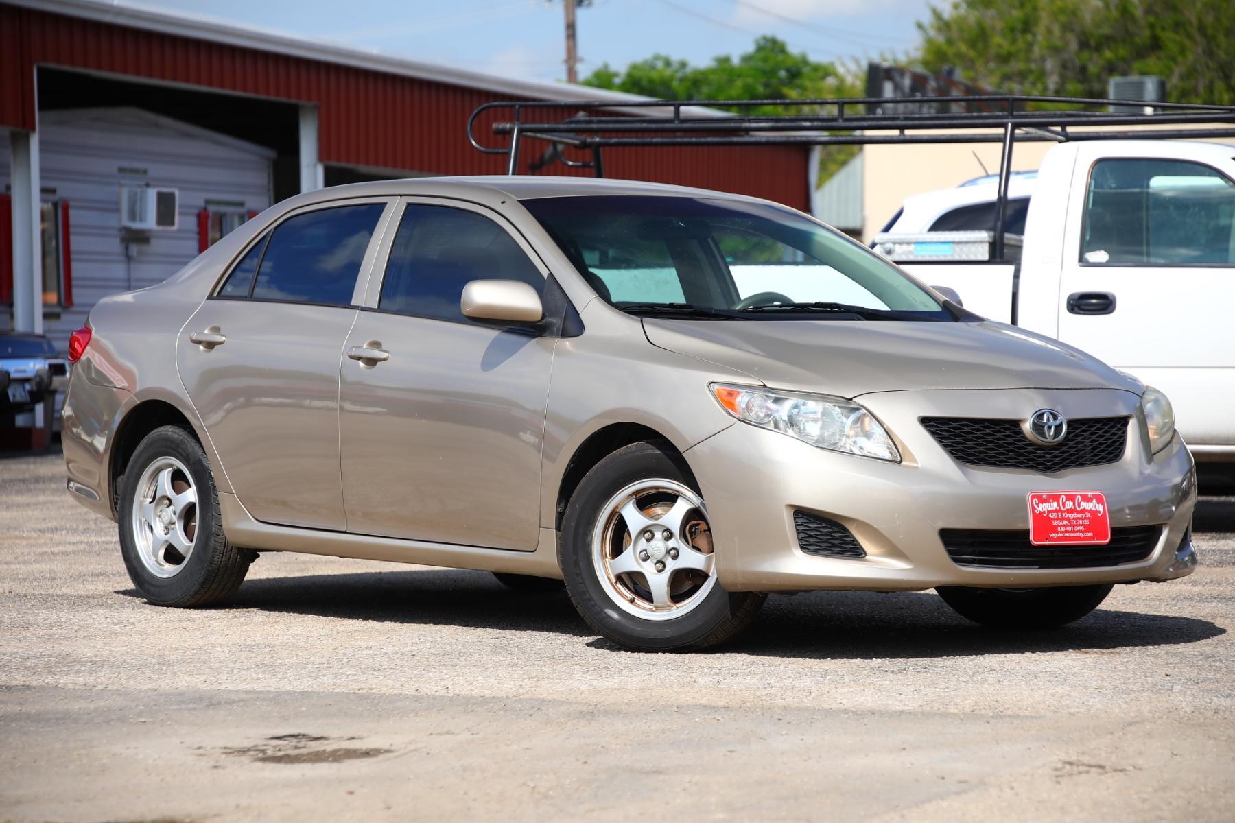2009 BROWN TOYOTA COROLLA Base 4-Speed AT (1NXBU40E89Z) with an 1.8L L4 DOHC 16V engine, 4-SPEED AUTOMATIC transmission, located at 420 E. Kingsbury St., Seguin, TX, 78155, (830) 401-0495, 29.581060, -97.961647 - Photo #1