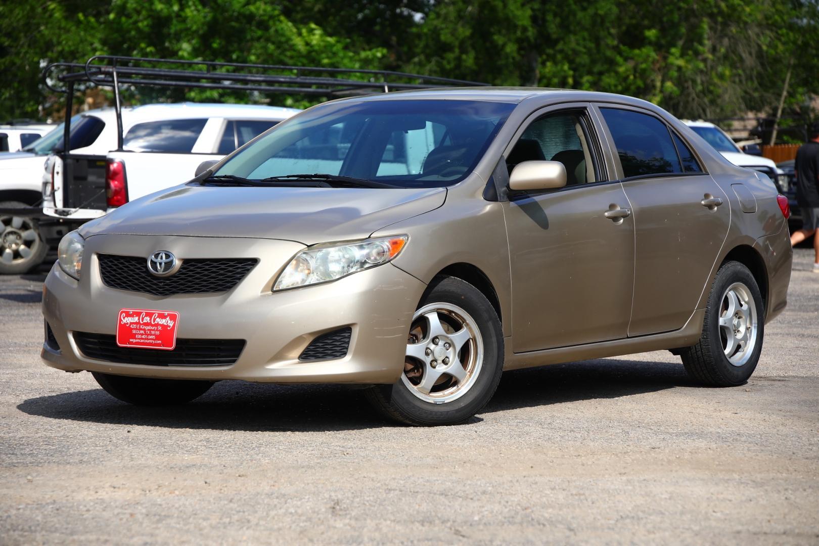 2009 BROWN TOYOTA COROLLA Base 4-Speed AT (1NXBU40E89Z) with an 1.8L L4 DOHC 16V engine, 4-SPEED AUTOMATIC transmission, located at 420 E. Kingsbury St., Seguin, TX, 78155, (830) 401-0495, 29.581060, -97.961647 - Photo#11