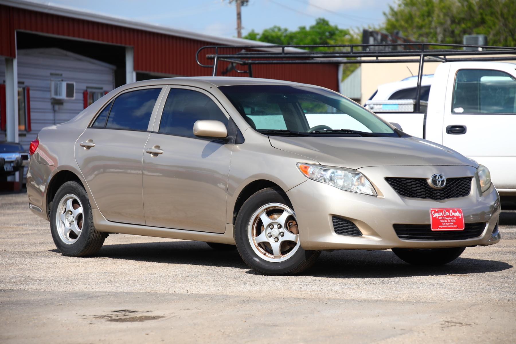 2009 BROWN TOYOTA COROLLA Base 4-Speed AT (1NXBU40E89Z) with an 1.8L L4 DOHC 16V engine, 4-SPEED AUTOMATIC transmission, located at 420 E. Kingsbury St., Seguin, TX, 78155, (830) 401-0495, 29.581060, -97.961647 - Photo #2