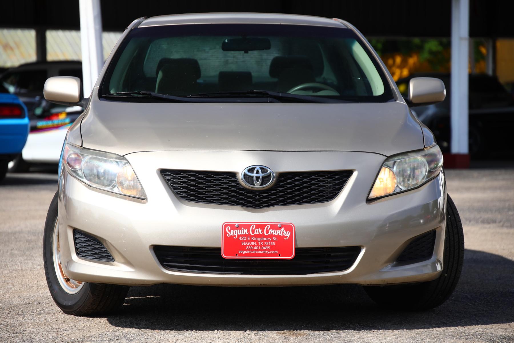 2009 BROWN TOYOTA COROLLA Base 4-Speed AT (1NXBU40E89Z) with an 1.8L L4 DOHC 16V engine, 4-SPEED AUTOMATIC transmission, located at 420 E. Kingsbury St., Seguin, TX, 78155, (830) 401-0495, 29.581060, -97.961647 - Photo #3