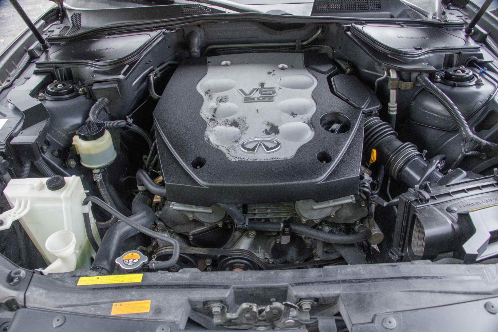 2006 BLACK INFINITI FX FX35 2WD (JNRAS08U46X) with an 3.5L V6 DOHC 24V engine, 5-SPEED AUTOMATIC transmission, located at 420 E. Kingsbury St., Seguin, TX, 78155, (830) 401-0495, 29.581060, -97.961647 - Photo#16