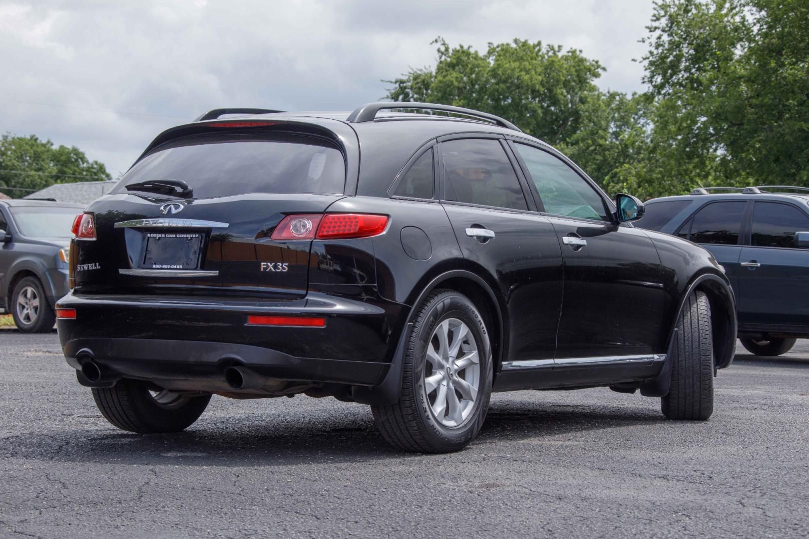 2006 BLACK INFINITI FX FX35 2WD (JNRAS08U46X) with an 3.5L V6 DOHC 24V engine, 5-SPEED AUTOMATIC transmission, located at 420 E. Kingsbury St., Seguin, TX, 78155, (830) 401-0495, 29.581060, -97.961647 - Photo#4