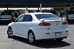 2009 WHITE /BLACK MITSUBISHI LANCER (JA3AU26U29U) with an 2.OL 4 CYLINDER engine, AUTOMATIC transmission, located at 420 E. Kingsbury St., Seguin, TX, 78155, (830) 401-0495, 29.581060, -97.961647 - Photo#2