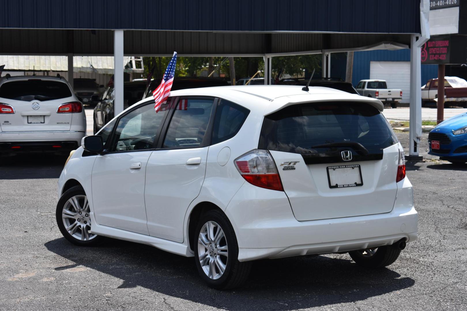2011 WHITE Honda Fit Sport 5-Speed AT (JHMGE8H56BS) with an 1.5L L4 SOHC 16V engine, 5-Speed Automatic transmission, located at 420 E. Kingsbury St., Seguin, TX, 78155, (830) 401-0495, 29.581060, -97.961647 - Photo#1