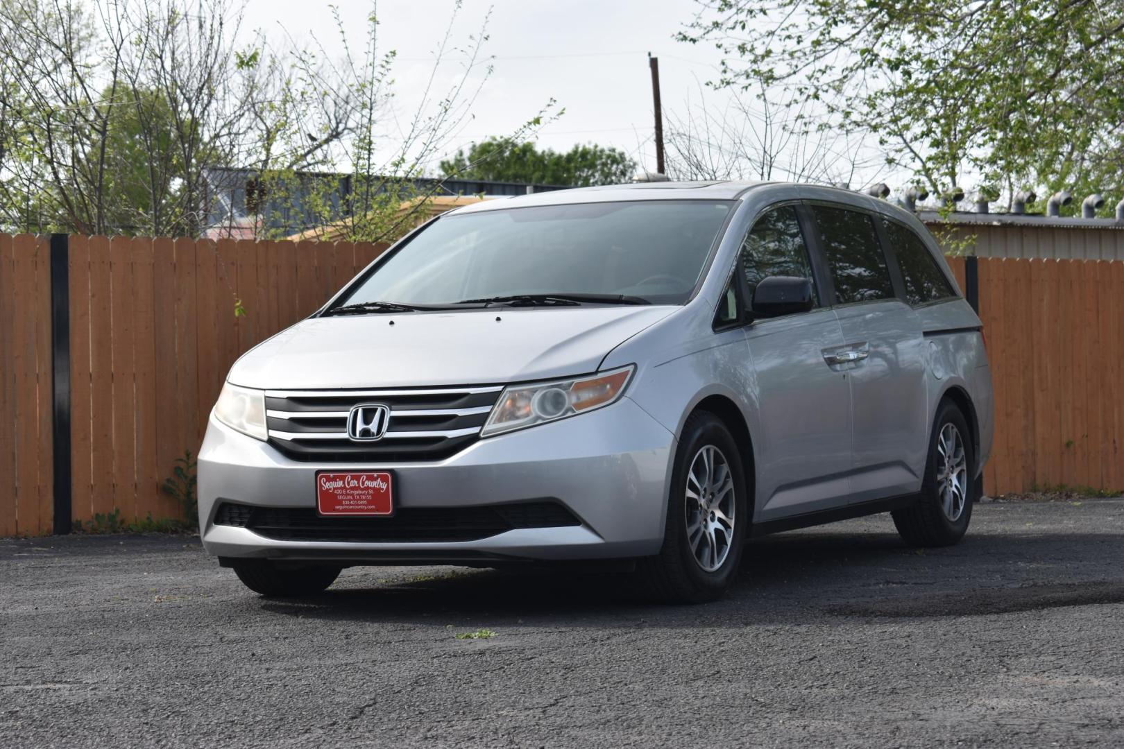 2013 SILVER Honda Odyssey EX-L (5FNRL5H69DB) with an 3.5L V6 SOHC 24V engine, 5-Speed Automatic transmission, located at 420 E. Kingsbury St., Seguin, TX, 78155, (830) 401-0495, 29.581060, -97.961647 - Photo#1