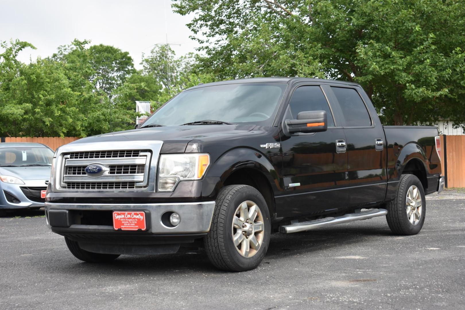 2013 BLACK Ford F-150 Platinum SuperCrew 6.5-ft. Bed 2WD (1FTFW1CT4DF) with an 3.5L V6 TURBO engine, 6-Speed Automatic transmission, located at 420 E. Kingsbury St., Seguin, TX, 78155, (830) 401-0495, 29.581060, -97.961647 - Photo#2