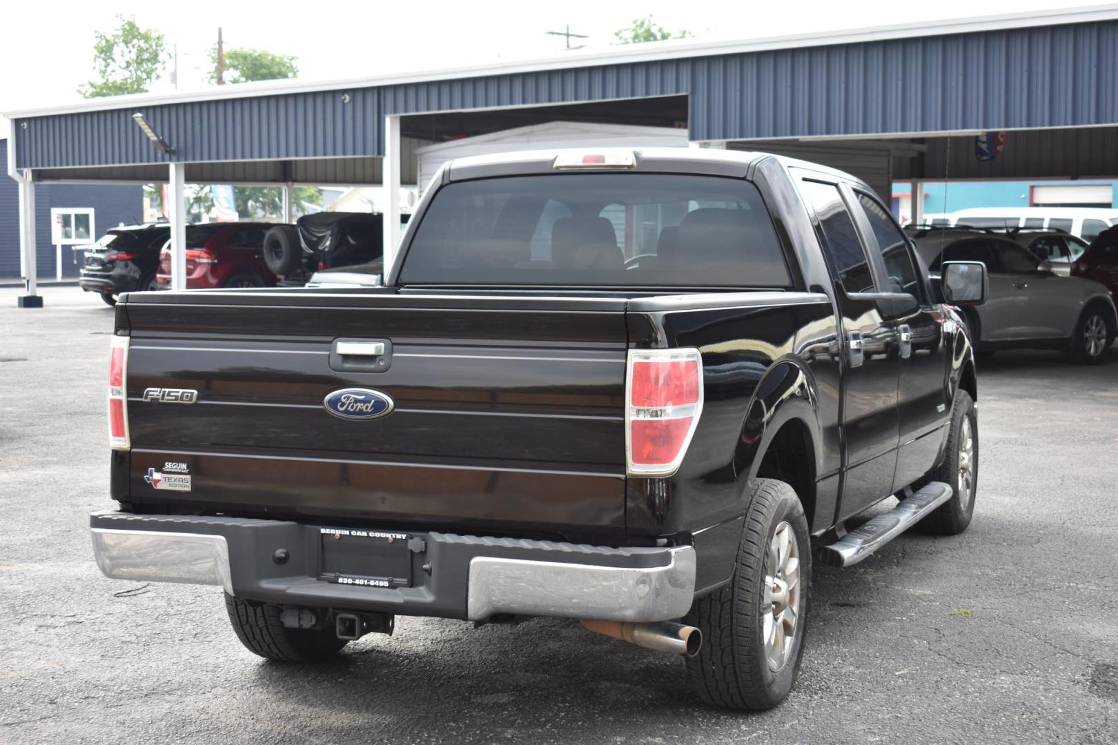 2013 BLACK Ford F-150 Platinum SuperCrew 6.5-ft. Bed 2WD (1FTFW1CT4DF) with an 3.5L V6 TURBO engine, 6-Speed Automatic transmission, located at 420 E. Kingsbury St., Seguin, TX, 78155, (830) 401-0495, 29.581060, -97.961647 - Photo#3