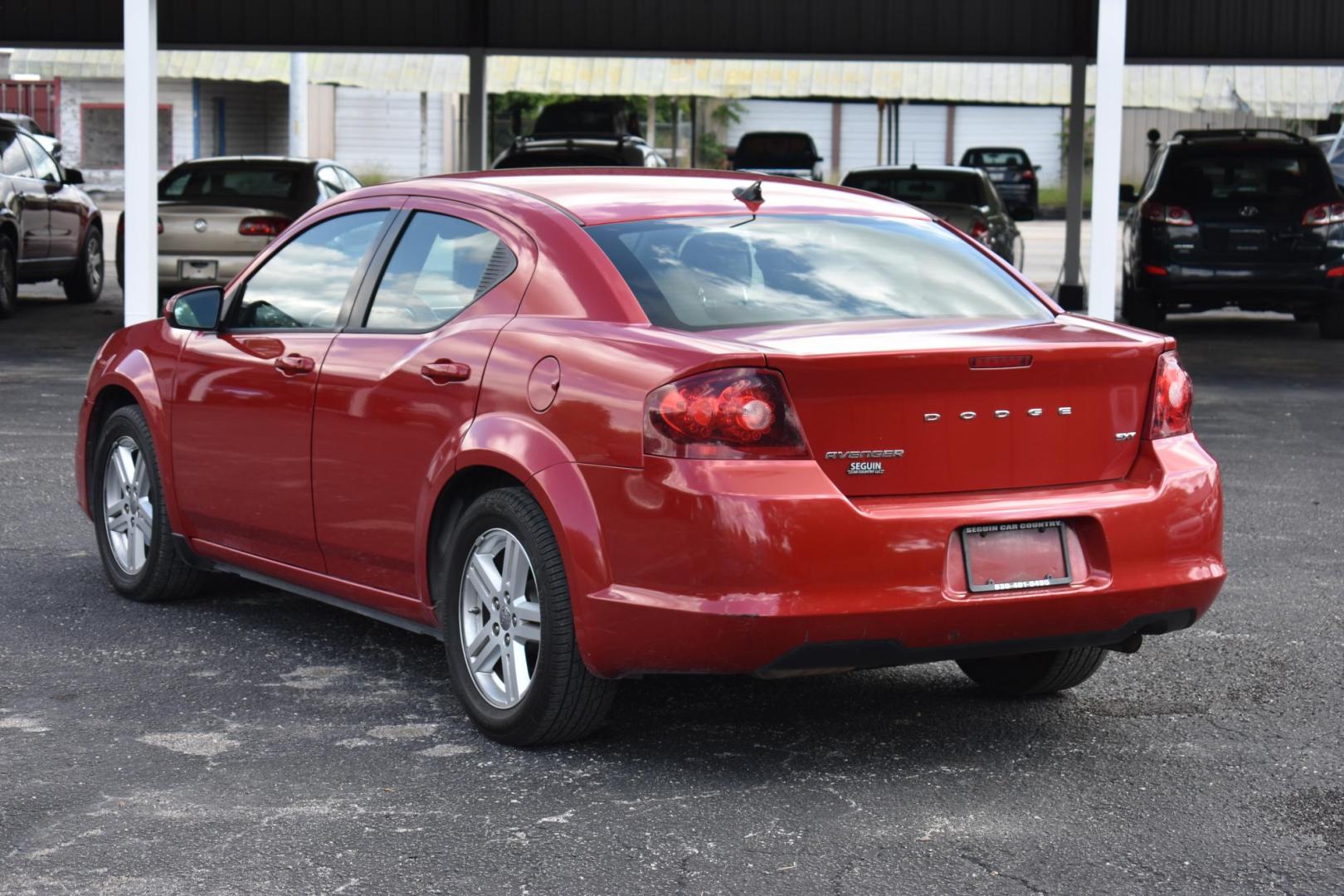 2014 RED Dodge Avenger SXT (1C3CDZCB2EN) with an 2.4L L4 DOHC 16V engine, 6-Speed Automatic transmission, located at 420 E. Kingsbury St., Seguin, TX, 78155, (830) 401-0495, 29.581060, -97.961647 - Photo#3