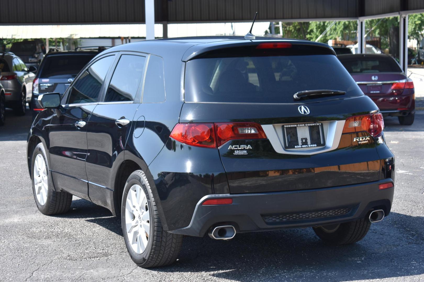 2010 BLACK Acura RDX 5-Spd AT SH-AWD with Technology Package (5J8TB2H5XAA) with an 2.3L L4 DOHC 16V engine, 5-Speed Automatic transmission, located at 420 E. Kingsbury St., Seguin, TX, 78155, (830) 401-0495, 29.581060, -97.961647 - Photo#3