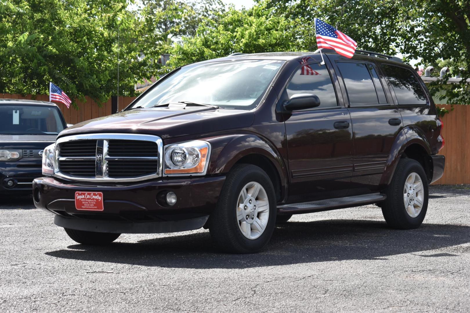 2005 MAROON Dodge Durango Adventurer Model 2WD (1D4HD48KX5F) with an 3.7L V6 SOHC 12V engine, 5-Speed Automatic Overdrive transmission, located at 420 E. Kingsbury St., Seguin, TX, 78155, (830) 401-0495, 29.581060, -97.961647 - Photo#1
