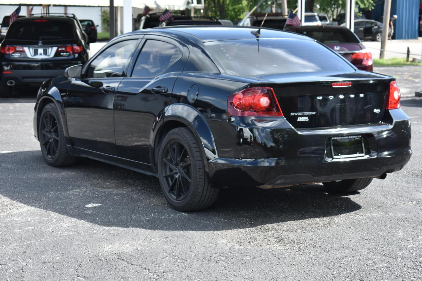 2013 BLACK Dodge Avenger Base (1C3CDZAB9DN) with an 2.4L L4 DOHC 16V engine, 4-Speed Automatic transmission, located at 420 E. Kingsbury St., Seguin, TX, 78155, (830) 401-0495, 29.581060, -97.961647 - Photo#3