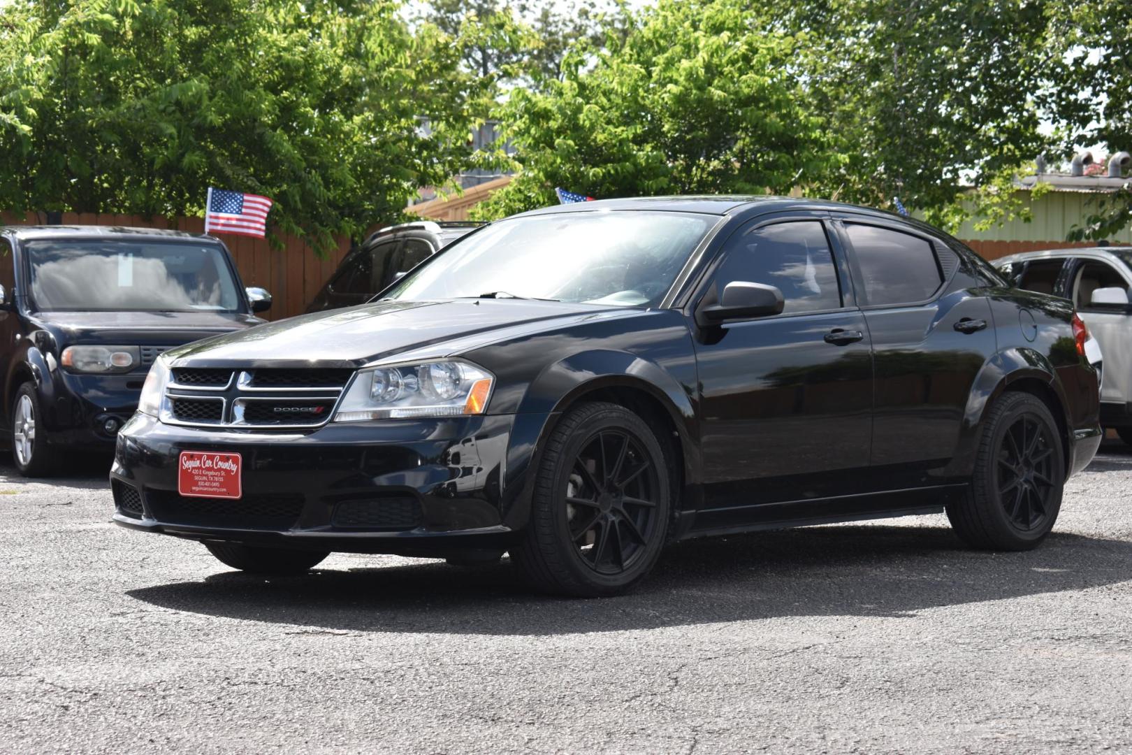 2013 BLACK Dodge Avenger Base (1C3CDZAB9DN) with an 2.4L L4 DOHC 16V engine, 4-Speed Automatic transmission, located at 420 E. Kingsbury St., Seguin, TX, 78155, (830) 401-0495, 29.581060, -97.961647 - Photo#2