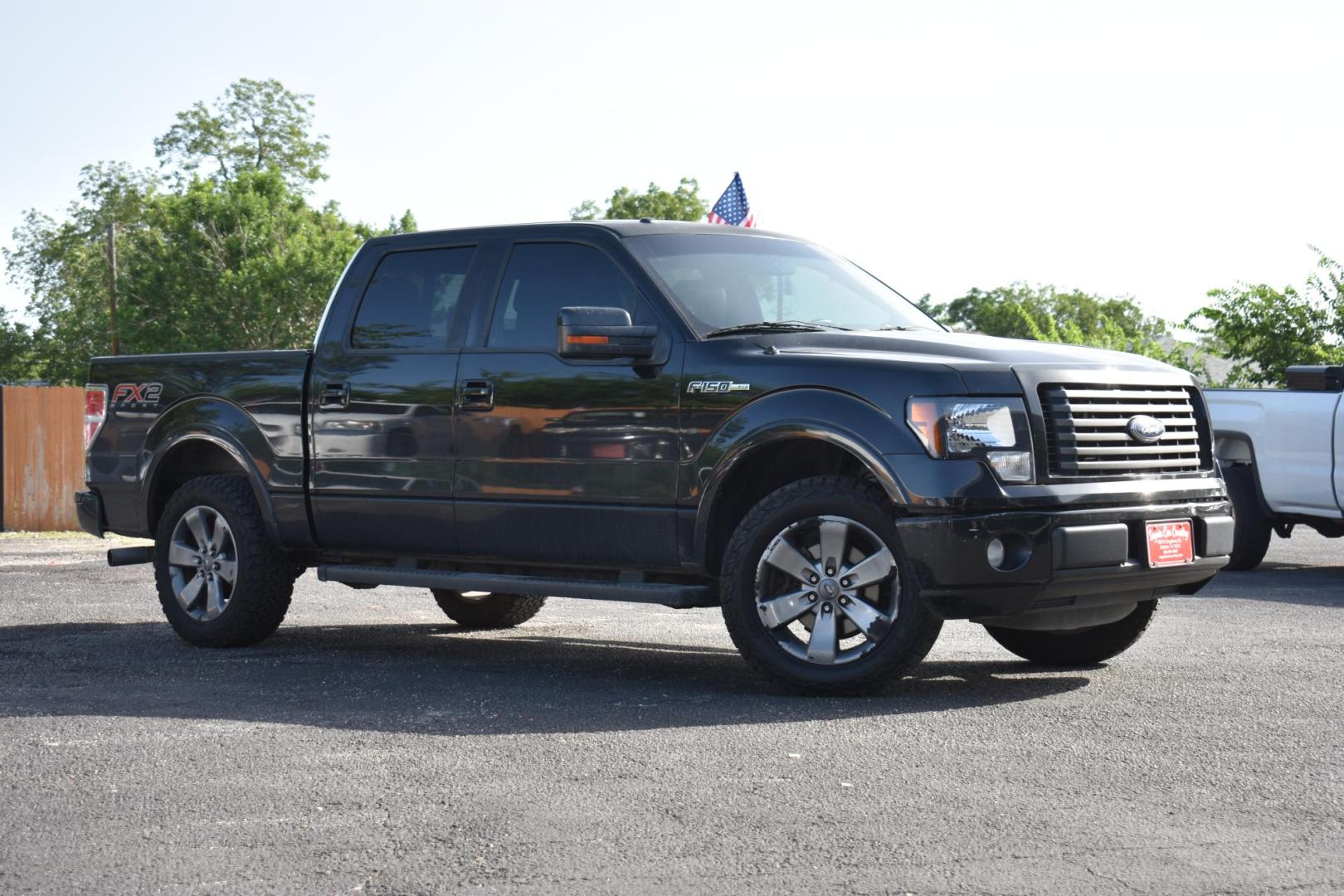 2012 BLACK Ford F-150 FX2 SuperCrew 5.5-ft. Bed 2WD (1FTFW1CF7CK) with an 5.0L V8 engine, 6-Speed Automatic transmission, located at 420 E. Kingsbury St., Seguin, TX, 78155, (830) 401-0495, 29.581060, -97.961647 - Photo#0