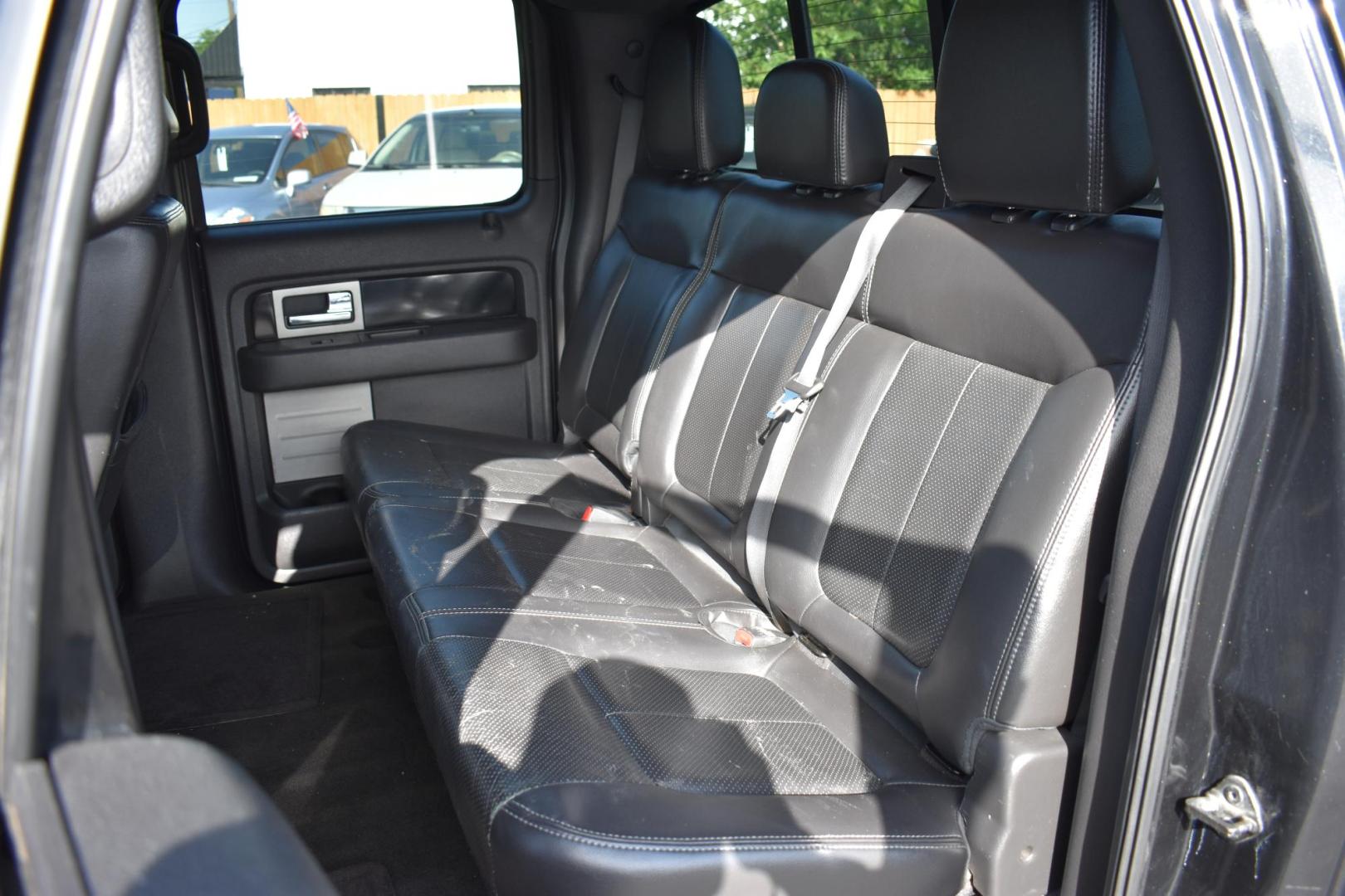 2012 BLACK Ford F-150 FX2 SuperCrew 5.5-ft. Bed 2WD (1FTFW1CF7CK) with an 5.0L V8 engine, 6-Speed Automatic transmission, located at 420 E. Kingsbury St., Seguin, TX, 78155, (830) 401-0495, 29.581060, -97.961647 - Photo#4