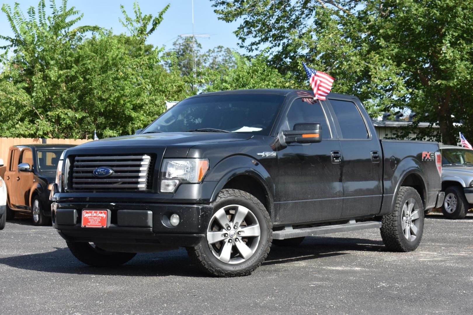 2012 BLACK Ford F-150 FX2 SuperCrew 5.5-ft. Bed 2WD (1FTFW1CF7CK) with an 5.0L V8 engine, 6-Speed Automatic transmission, located at 420 E. Kingsbury St., Seguin, TX, 78155, (830) 401-0495, 29.581060, -97.961647 - Photo#1