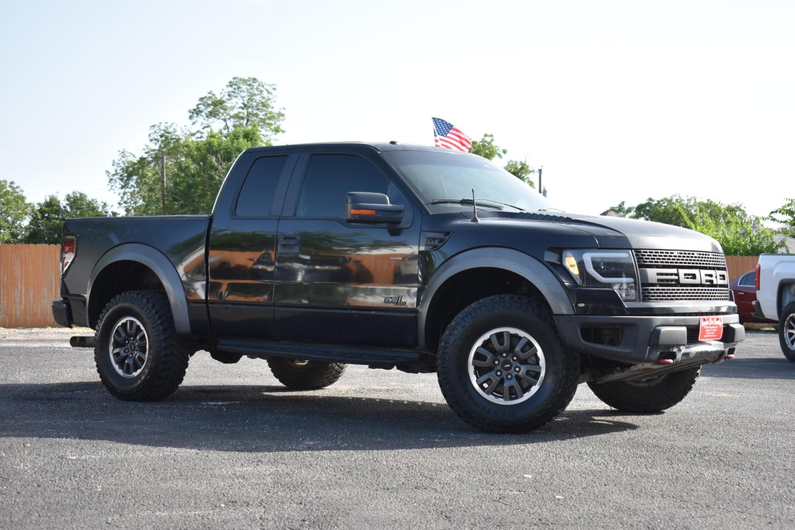 2011 BLACK Ford F-150 SVT Raptor SuperCab 5.5-ft. Bed 4WD (1FTEX1R61BF) with an 6.2L V8 SOHC 16V engine, 4-Speed Automatic transmission, located at 420 E. Kingsbury St., Seguin, TX, 78155, (830) 401-0495, 29.581060, -97.961647 - Photo#0