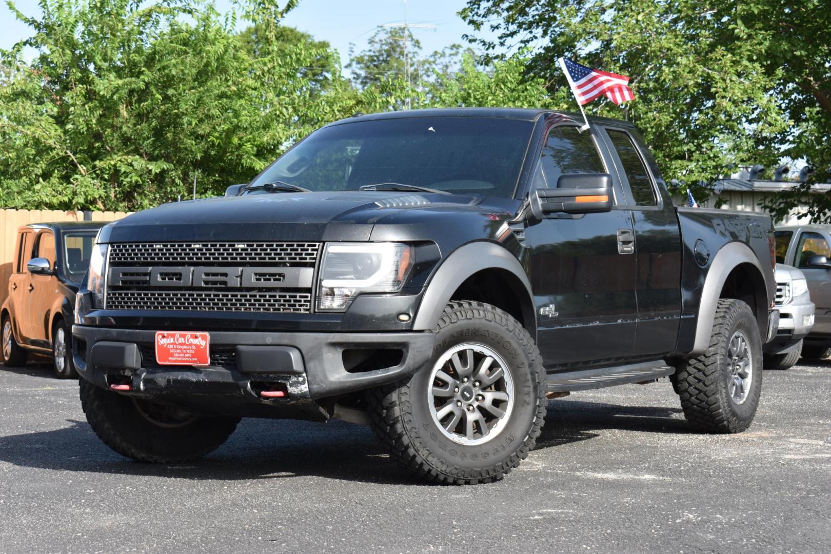 2011 BLACK Ford F-150 SVT Raptor SuperCab 5.5-ft. Bed 4WD (1FTEX1R61BF) with an 6.2L V8 SOHC 16V engine, 4-Speed Automatic transmission, located at 420 E. Kingsbury St., Seguin, TX, 78155, (830) 401-0495, 29.581060, -97.961647 - Photo#1