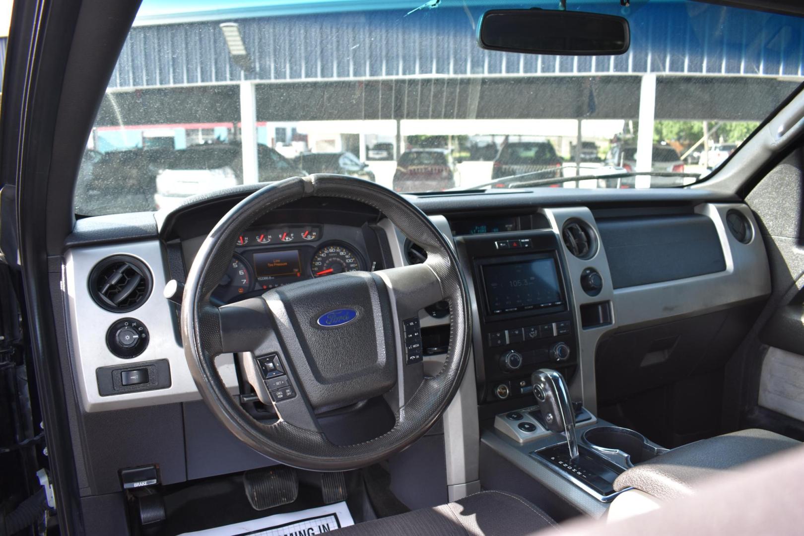 2011 BLACK Ford F-150 SVT Raptor SuperCab 5.5-ft. Bed 4WD (1FTEX1R61BF) with an 6.2L V8 SOHC 16V engine, 4-Speed Automatic transmission, located at 420 E. Kingsbury St., Seguin, TX, 78155, (830) 401-0495, 29.581060, -97.961647 - Photo#5