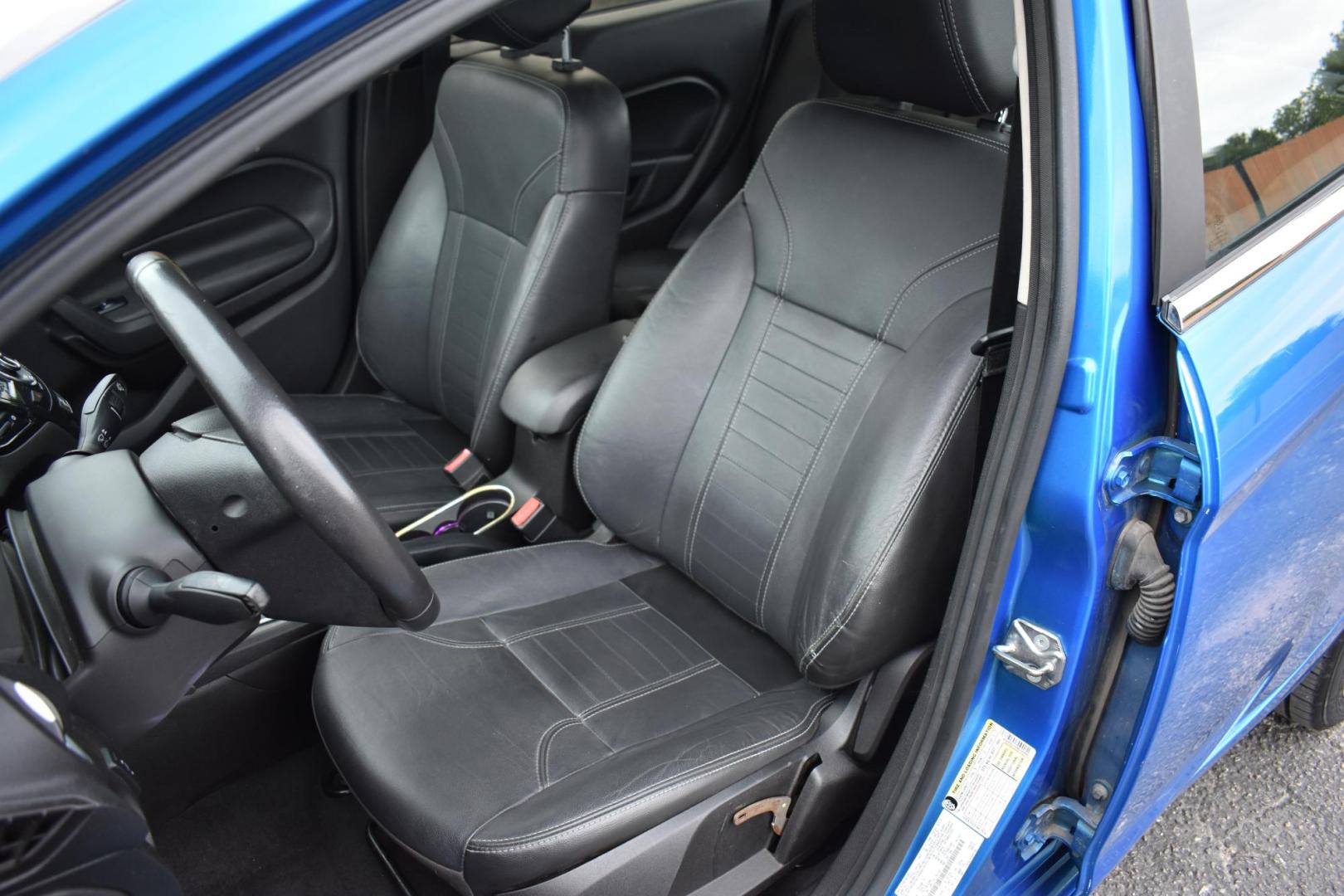 2015 BLUE Ford Fiesta Titanium Sedan (3FADP4CJ1FM) with an 1.6L L4 DOHC 16V engine, located at 420 E. Kingsbury St., Seguin, TX, 78155, (830) 401-0495, 29.581060, -97.961647 - Photo#4