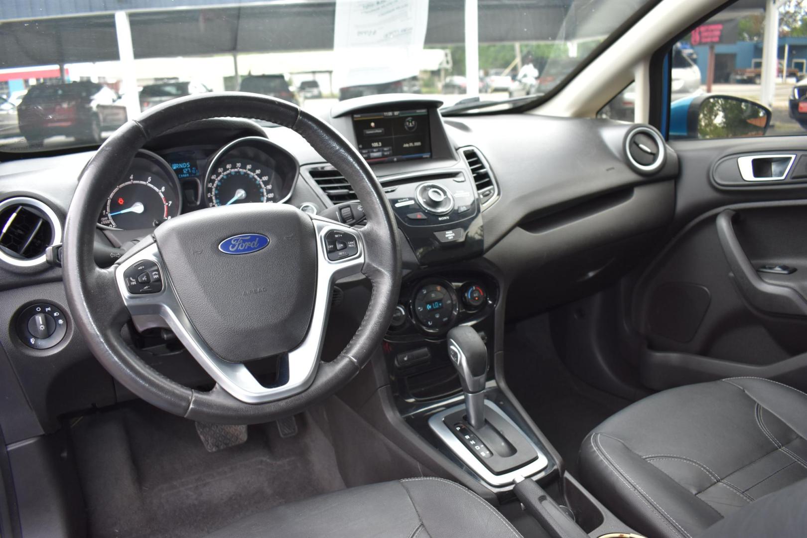 2015 BLUE Ford Fiesta Titanium Sedan (3FADP4CJ1FM) with an 1.6L L4 DOHC 16V engine, located at 420 E. Kingsbury St., Seguin, TX, 78155, (830) 401-0495, 29.581060, -97.961647 - Photo#6
