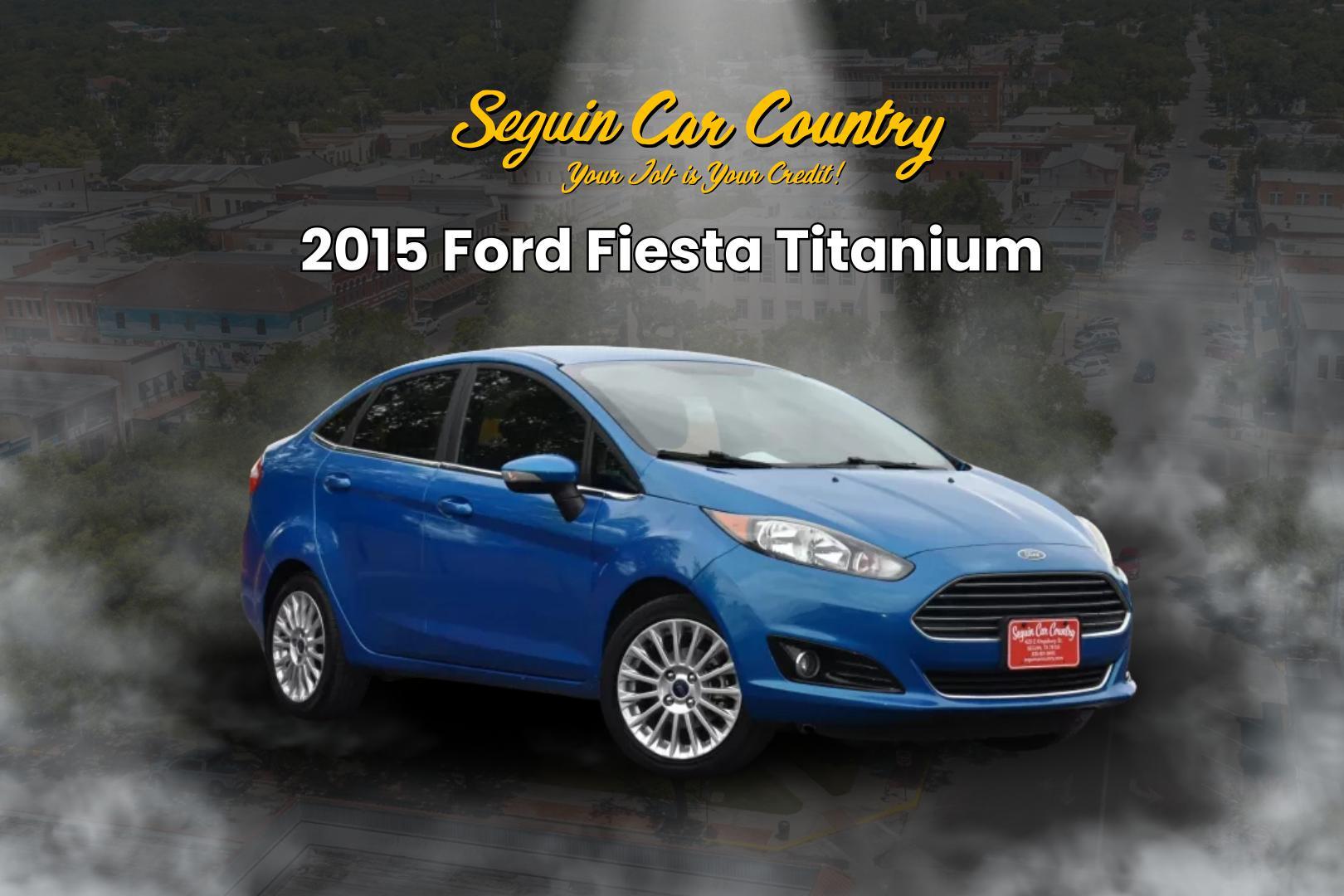 2015 BLUE Ford Fiesta Titanium Sedan (3FADP4CJ1FM) with an 1.6L L4 DOHC 16V engine, located at 420 E. Kingsbury St., Seguin, TX, 78155, (830) 401-0495, 29.581060, -97.961647 - Photo#0
