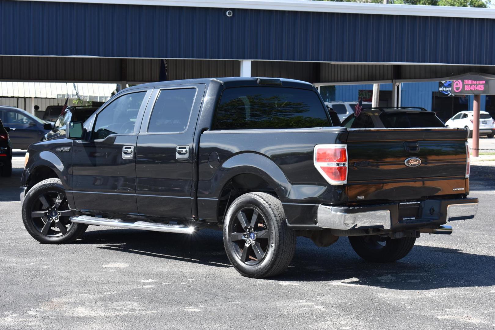 2012 BLACK Ford F-150 FX2 SuperCrew 5.5-ft. Bed 2WD (1FTFW1CF1CK) with an 5.0L V8 engine, 6-Speed Automatic transmission, located at 420 E. Kingsbury St., Seguin, TX, 78155, (830) 401-0495, 29.581060, -97.961647 - Photo#2