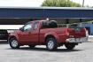 2015 RED Nissan Frontier SV King Cab I4 5MT 2WD (1N6BD0CTXFN) with an 2.5L L4 DOHC 16V engine, 5-Speed Manual transmission, located at 420 E. Kingsbury St., Seguin, TX, 78155, (830) 401-0495, 29.581060, -97.961647 - Photo#2