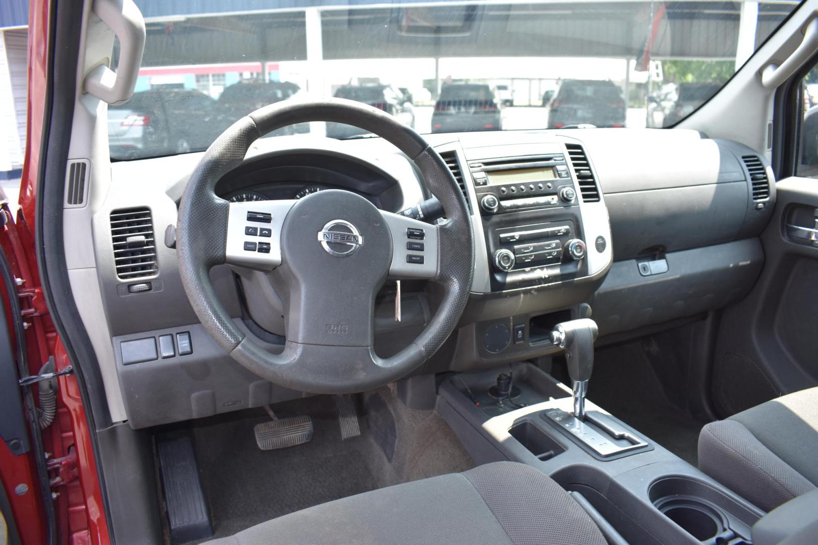 2015 RED Nissan Frontier SV King Cab I4 5MT 2WD (1N6BD0CTXFN) with an 2.5L L4 DOHC 16V engine, 5-Speed Manual transmission, located at 420 E. Kingsbury St., Seguin, TX, 78155, (830) 401-0495, 29.581060, -97.961647 - Photo#6