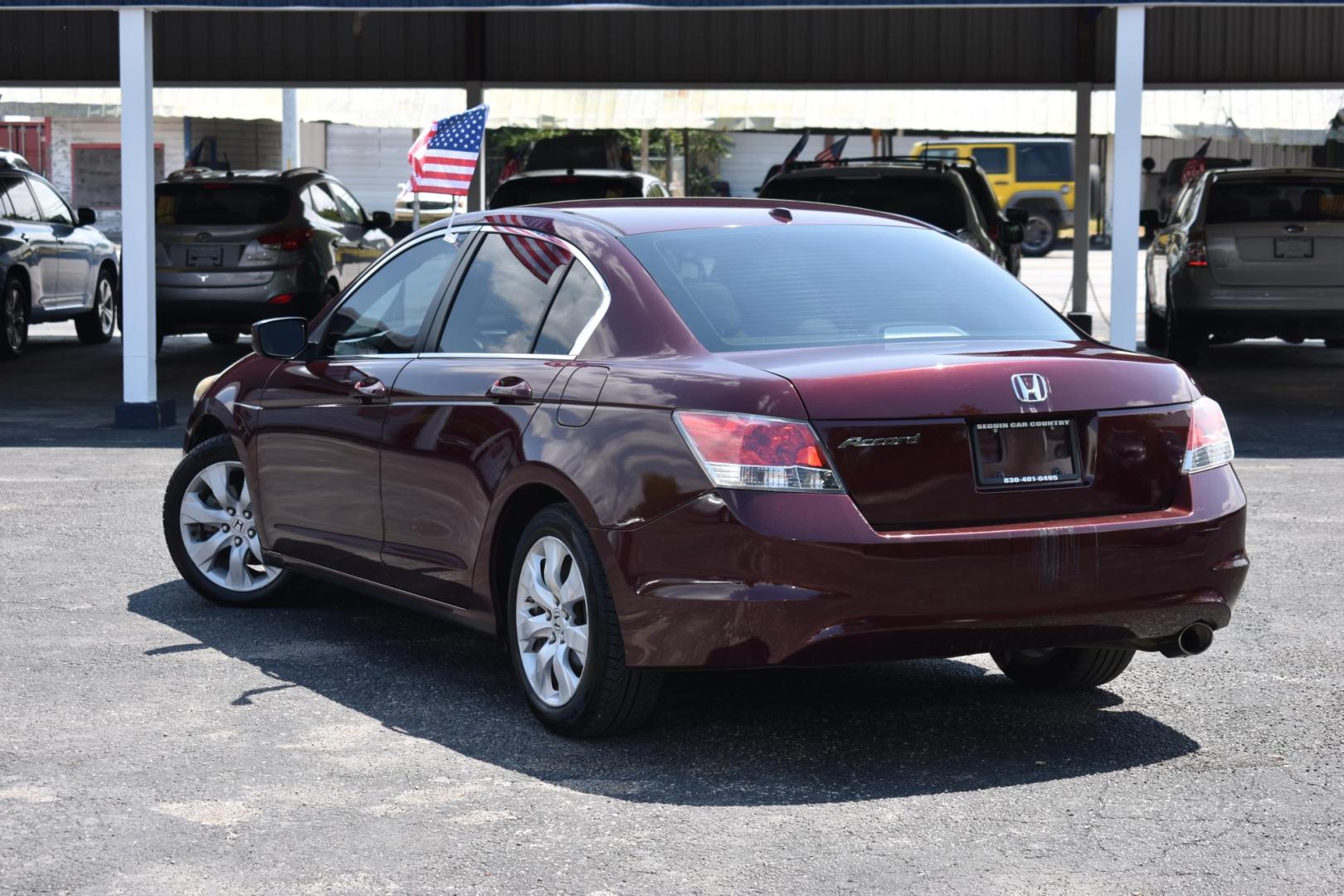 2009 MAROON Honda Accord EX-L Sedan AT (1HGCP26829A) with an 2.4L L4 DOHC 16V engine, 5-Speed Automatic transmission, located at 420 E. Kingsbury St., Seguin, TX, 78155, (830) 401-0495, 29.581060, -97.961647 - Photo#2