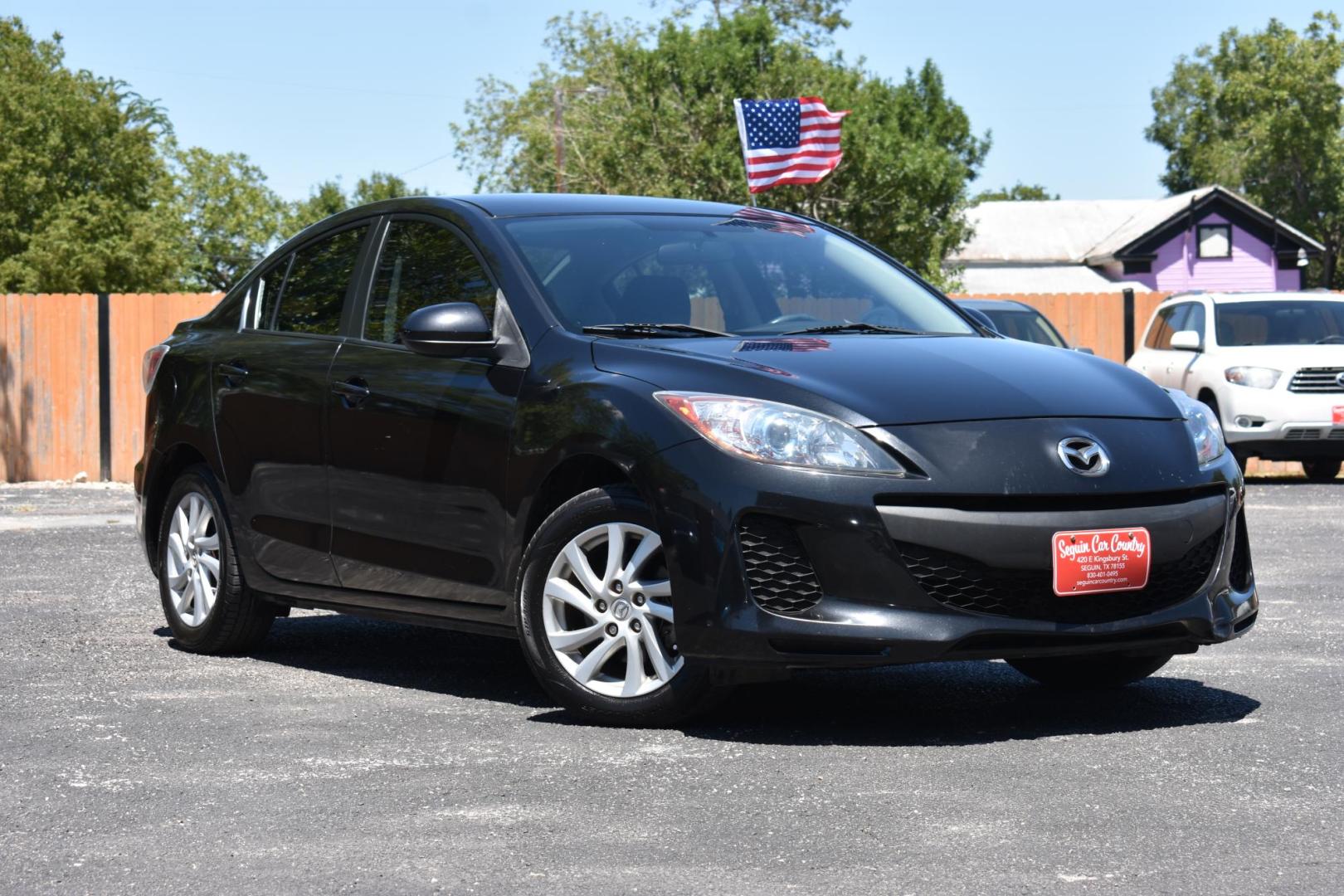 2012 BLACK Mazda MAZDA3 i Touring 4-Door (JM1BL1V78C1) with an 2.0L L4 DOHC 16V engine, located at 420 E. Kingsbury St., Seguin, TX, 78155, (830) 401-0495, 29.581060, -97.961647 - Photo#1