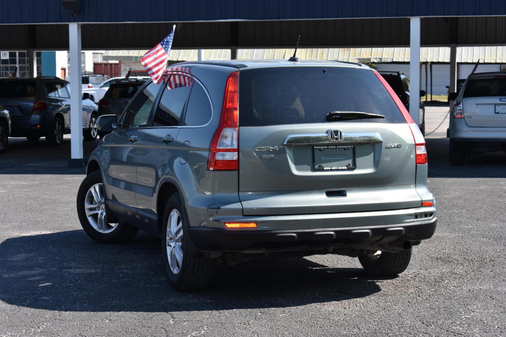 2010 BLUE Honda CR-V EX-L 4WD 5-Speed AT (JHLRE4H70AC) with an 2.4L L4 DOHC 16V engine, 5-Speed Automatic transmission, located at 420 E. Kingsbury St., Seguin, TX, 78155, (830) 401-0495, 29.581060, -97.961647 - Photo#2