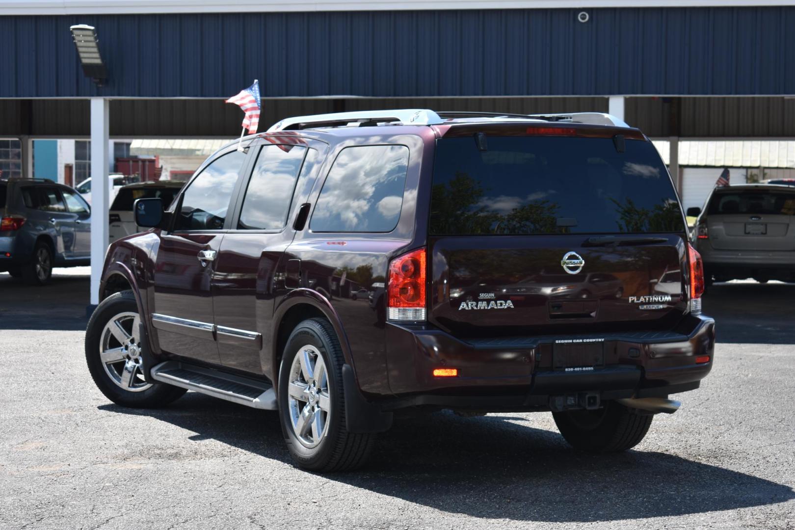 2013 MAROON Nissan Armada Platinum 2WD (5N1BA0NF4DN) with an 5.6L V8 DOHC 32V FFV engine, 5-Speed Automatic transmission, located at 420 E. Kingsbury St., Seguin, TX, 78155, (830) 401-0495, 29.581060, -97.961647 - Photo#2
