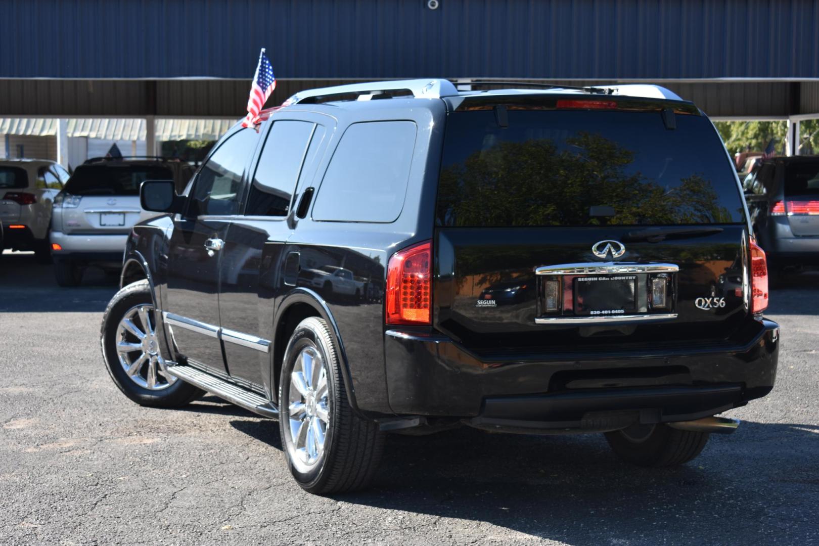 2010 BLACK Infiniti QX56 RWD (5N3ZA0NF1AN) with an 5.6L V8 DOHC 32V engine, 5-Speed Automatic transmission, located at 420 E. Kingsbury St., Seguin, TX, 78155, (830) 401-0495, 29.581060, -97.961647 - Photo#3