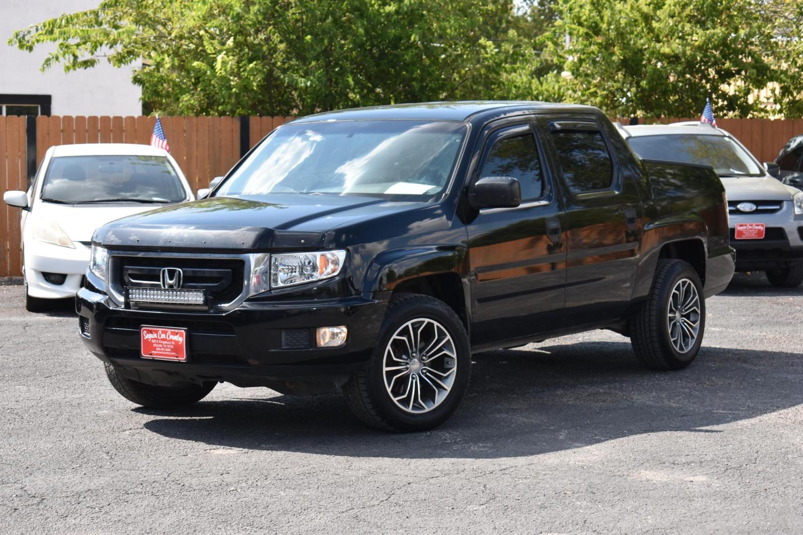 2011 BLACK Honda Ridgeline RTS (5FPYK1F4XBB) with an 3.5L V6 SOHC 24V engine, 5-Speed Automatic transmission, located at 420 E. Kingsbury St., Seguin, TX, 78155, (830) 401-0495, 29.581060, -97.961647 - Photo#3