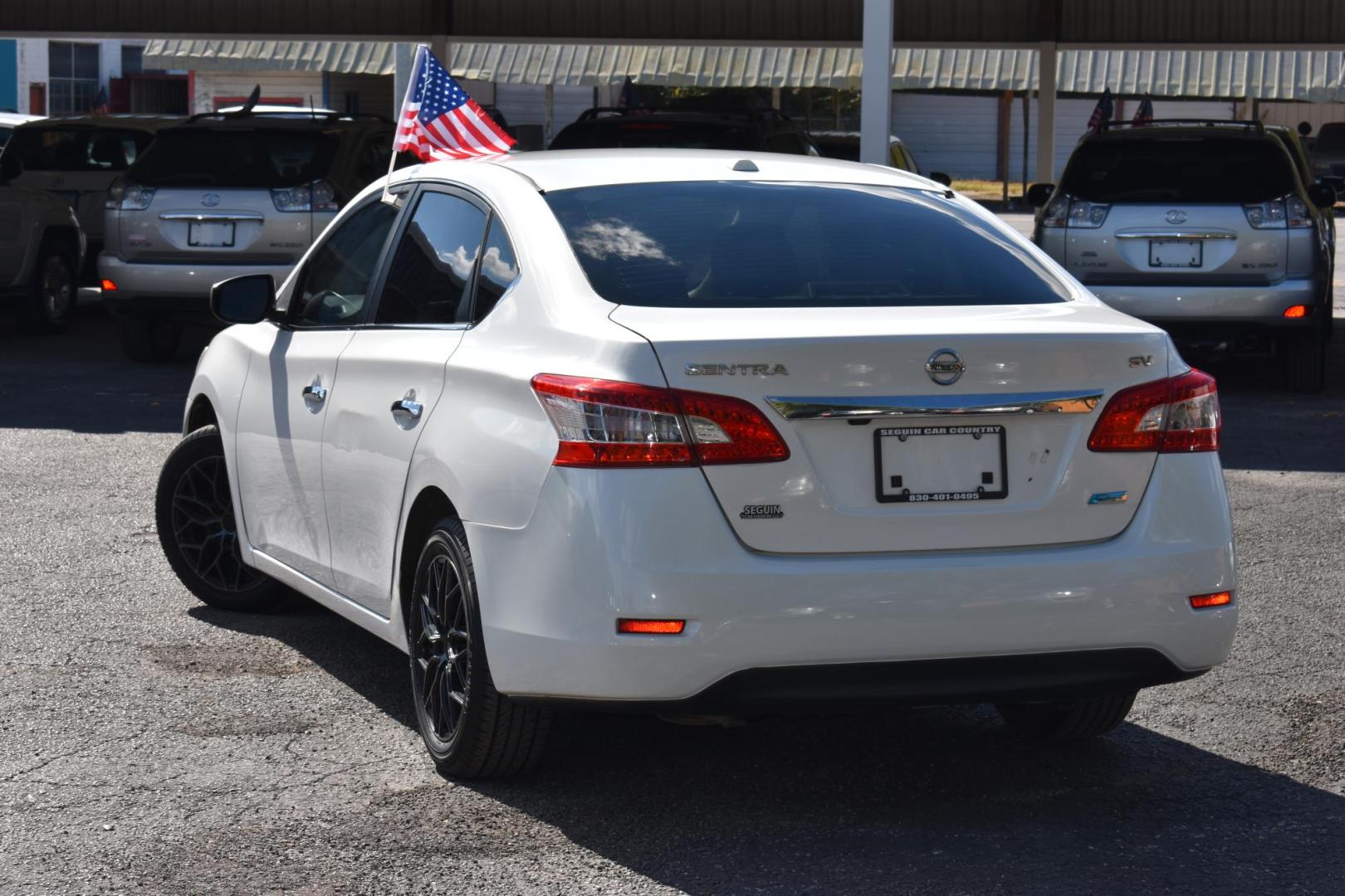 2013 WHITE Nissan Sentra S 6MT (3N1AB7AP2DL) with an 2.0L L4 DOHC 16V engine, 6-Speed Manual transmission, located at 420 E. Kingsbury St., Seguin, TX, 78155, (830) 401-0495, 29.581060, -97.961647 - Photo#1