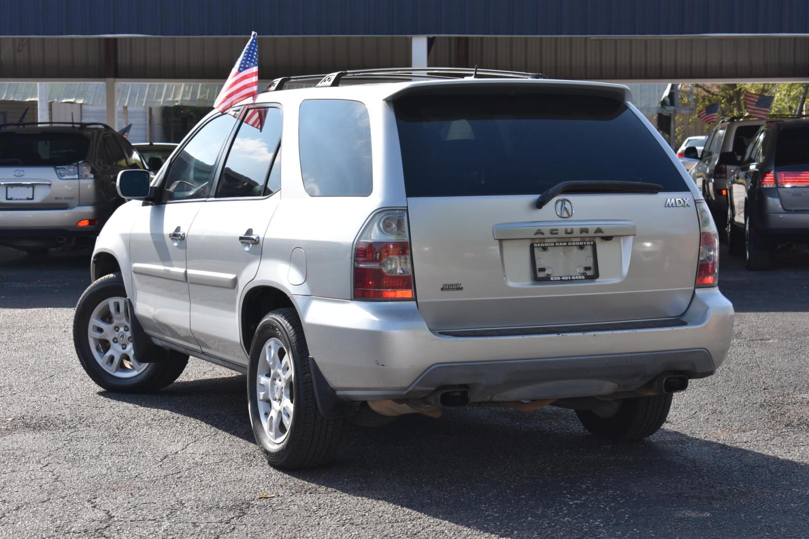 2006 SILVER Acura MDX Touring with Navigation System and Rear DVD System (2HNYD18936H) with an 3.5L V6 SOHC 24V engine, 5-Speed Automatic Overdrive transmission, located at 420 E. Kingsbury St., Seguin, TX, 78155, (830) 401-0495, 29.581060, -97.961647 - Photo#1
