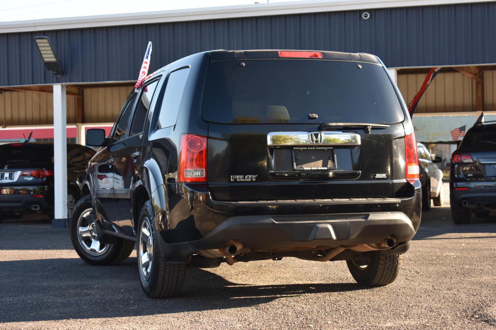 2013 BLACK Honda Pilot LX 2WD 5-Spd AT (5FNYF3H28DB) with an 3.5L V6 SOHC 24V engine, 5-Speed Automatic transmission, located at 420 E. Kingsbury St., Seguin, TX, 78155, (830) 401-0495, 29.581060, -97.961647 - Photo#2