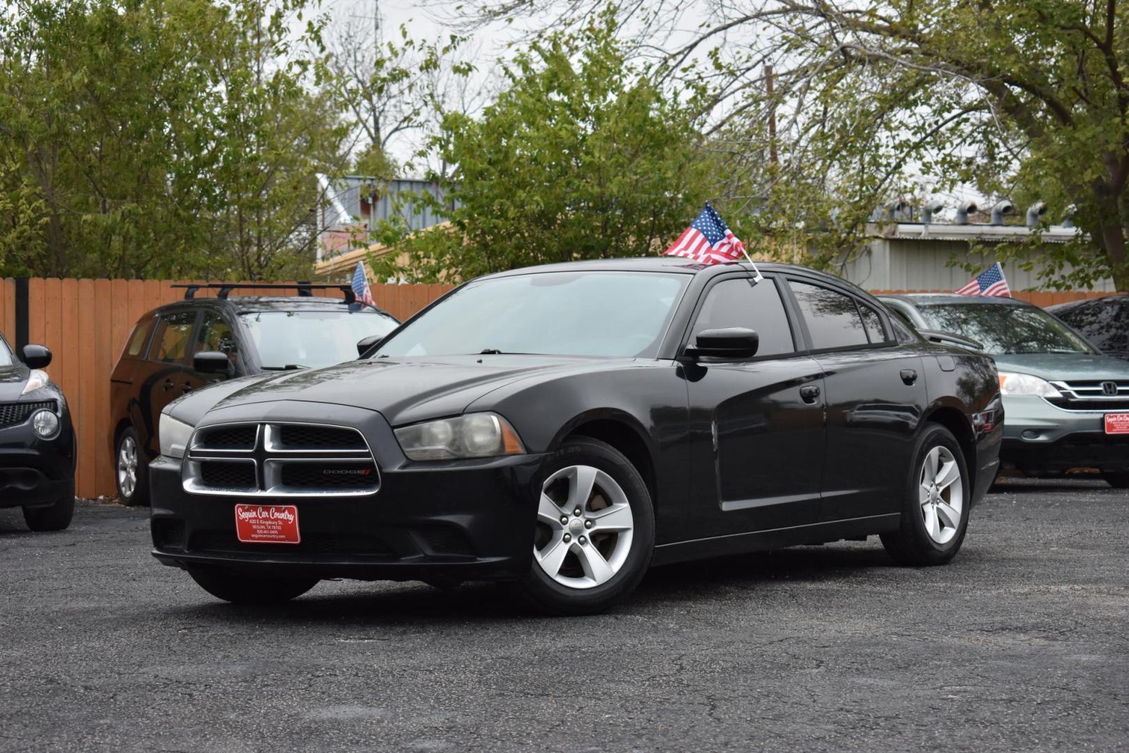 2014 BLACK Dodge Charger SE (2C3CDXBG9EH) with an 3.6L V6 DOHC 24V engine, 5-Speed Automatic transmission, located at 420 E. Kingsbury St., Seguin, TX, 78155, (830) 401-0495, 29.581060, -97.961647 - Photo#3
