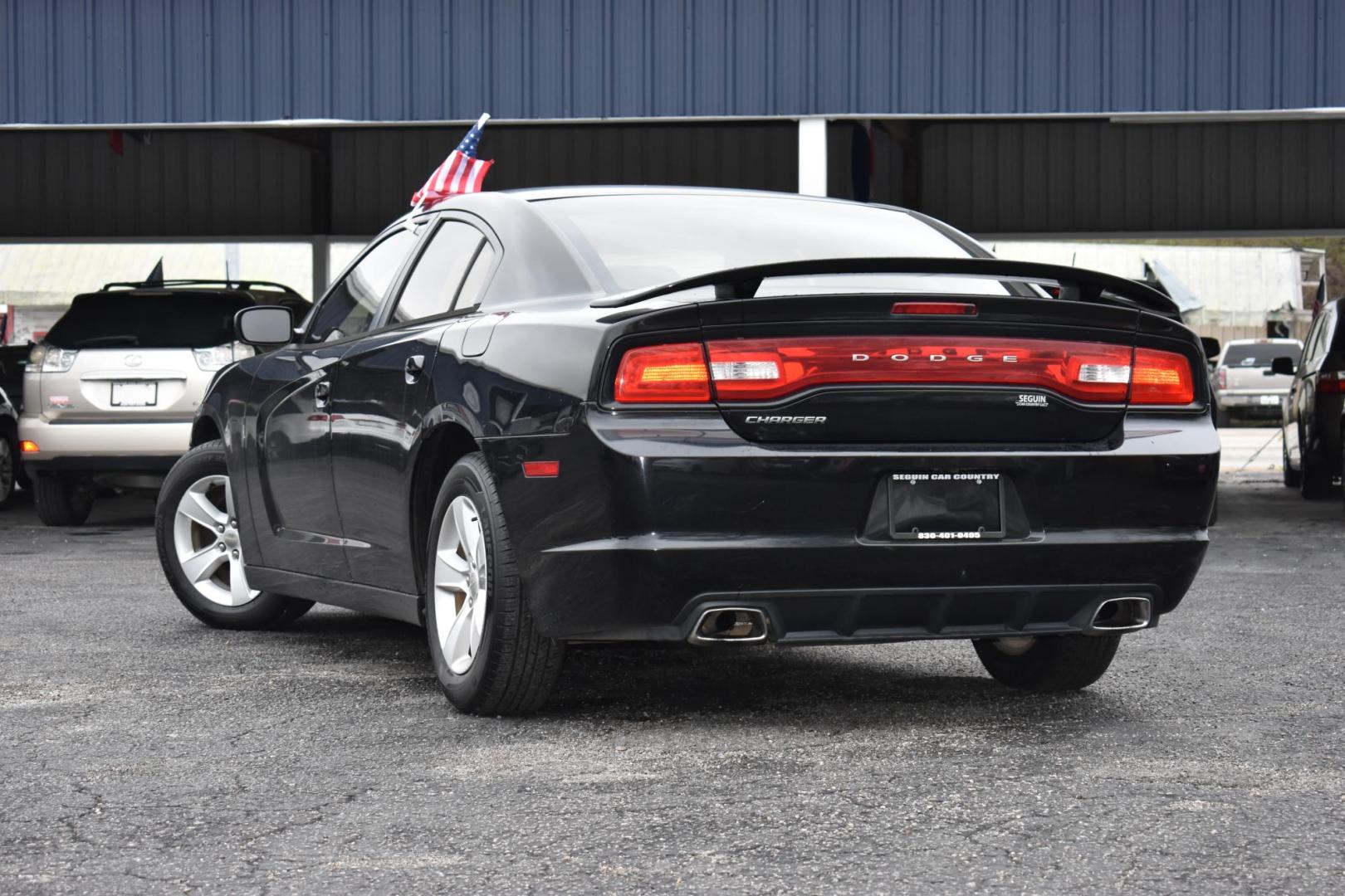 2014 BLACK Dodge Charger SE (2C3CDXBG9EH) with an 3.6L V6 DOHC 24V engine, 5-Speed Automatic transmission, located at 420 E. Kingsbury St., Seguin, TX, 78155, (830) 401-0495, 29.581060, -97.961647 - Photo#2