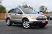 2007 TAN Honda CR-V EX 2WD AT (JHLRE385X7C) with an 2.4L L4 DOHC 16V engine, 5-Speed Automatic Overdrive transmission, located at 420 E. Kingsbury St., Seguin, TX, 78155, (830) 401-0495, 29.581060, -97.961647 - Photo#1
