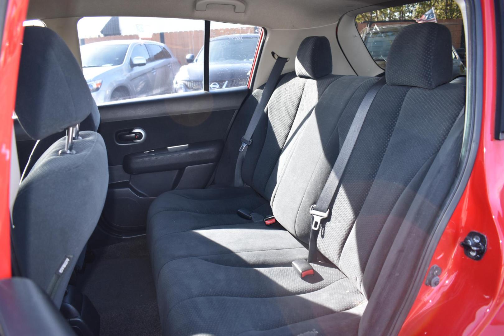 2011 RED Nissan Versa 1.8 S Hatchback (3N1BC1CP7BL) with an 1.8L L4 DOHC 16V engine, located at 420 E. Kingsbury St., Seguin, TX, 78155, (830) 401-0495, 29.581060, -97.961647 - Photo#4