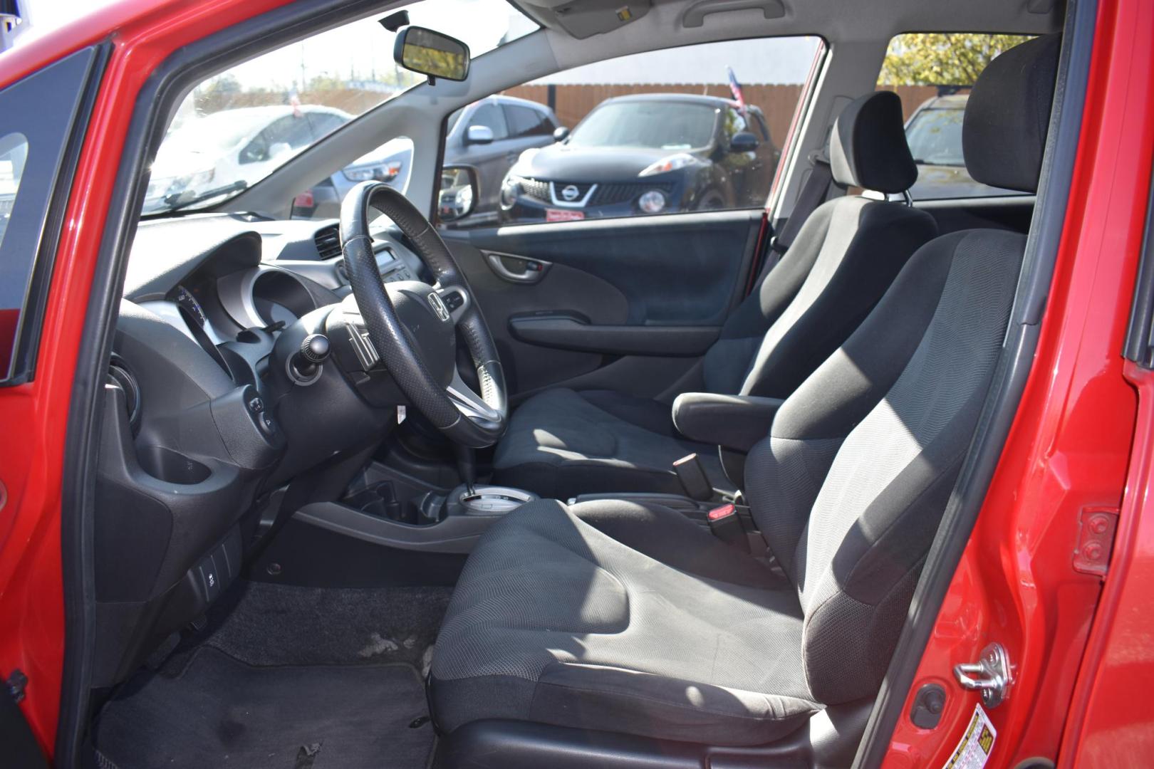 2011 RED Honda Fit Sport 5-Speed AT (JHMGE8H56BC) with an 1.5L L4 SOHC 16V engine, 5-Speed Automatic transmission, located at 420 E. Kingsbury St., Seguin, TX, 78155, (830) 401-0495, 29.581060, -97.961647 - Photo#4