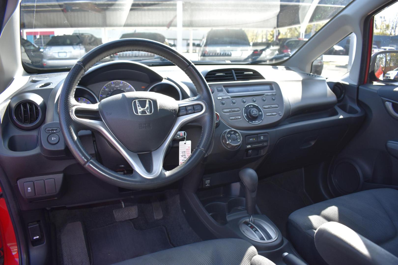 2011 RED Honda Fit Sport 5-Speed AT (JHMGE8H56BC) with an 1.5L L4 SOHC 16V engine, 5-Speed Automatic transmission, located at 420 E. Kingsbury St., Seguin, TX, 78155, (830) 401-0495, 29.581060, -97.961647 - Photo#6