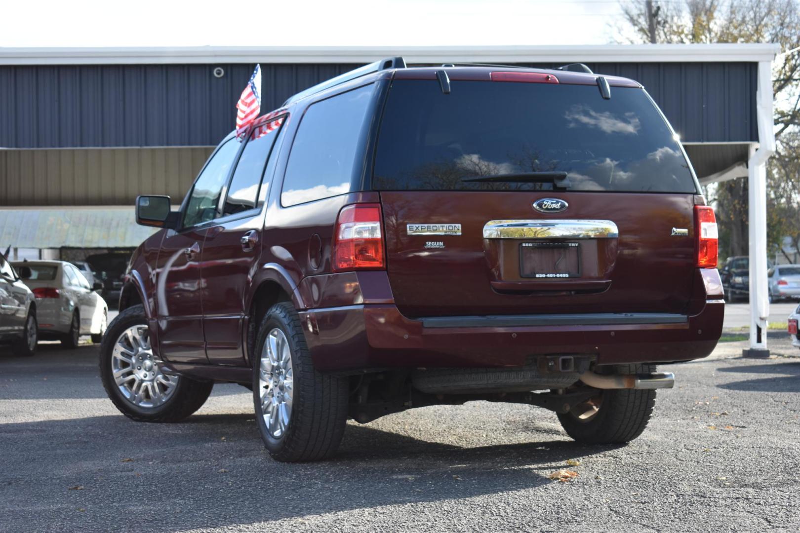 2013 RED Ford Expedition Limited 2WD (1FMJU1K53DE) with an 5.4L V8 SOHC 16V FFV engine, 6-Speed Automatic transmission, located at 420 E. Kingsbury St., Seguin, TX, 78155, (830) 401-0495, 29.581060, -97.961647 - Photo#2
