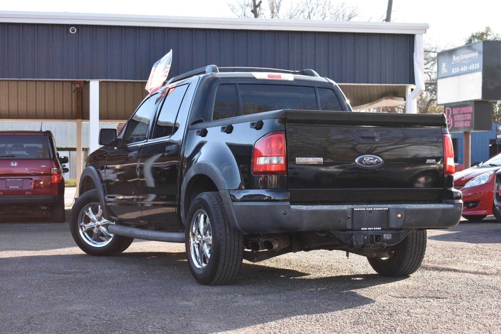 2010 BLACK Ford Explorer Sport Trac XLT 4.0L 2WD (1FMEU3BEXAU) with an 4.0L V6 SOHC 12V engine, 5-Speed Automatic transmission, located at 420 E. Kingsbury St., Seguin, TX, 78155, (830) 401-0495, 29.581060, -97.961647 - Photo#2