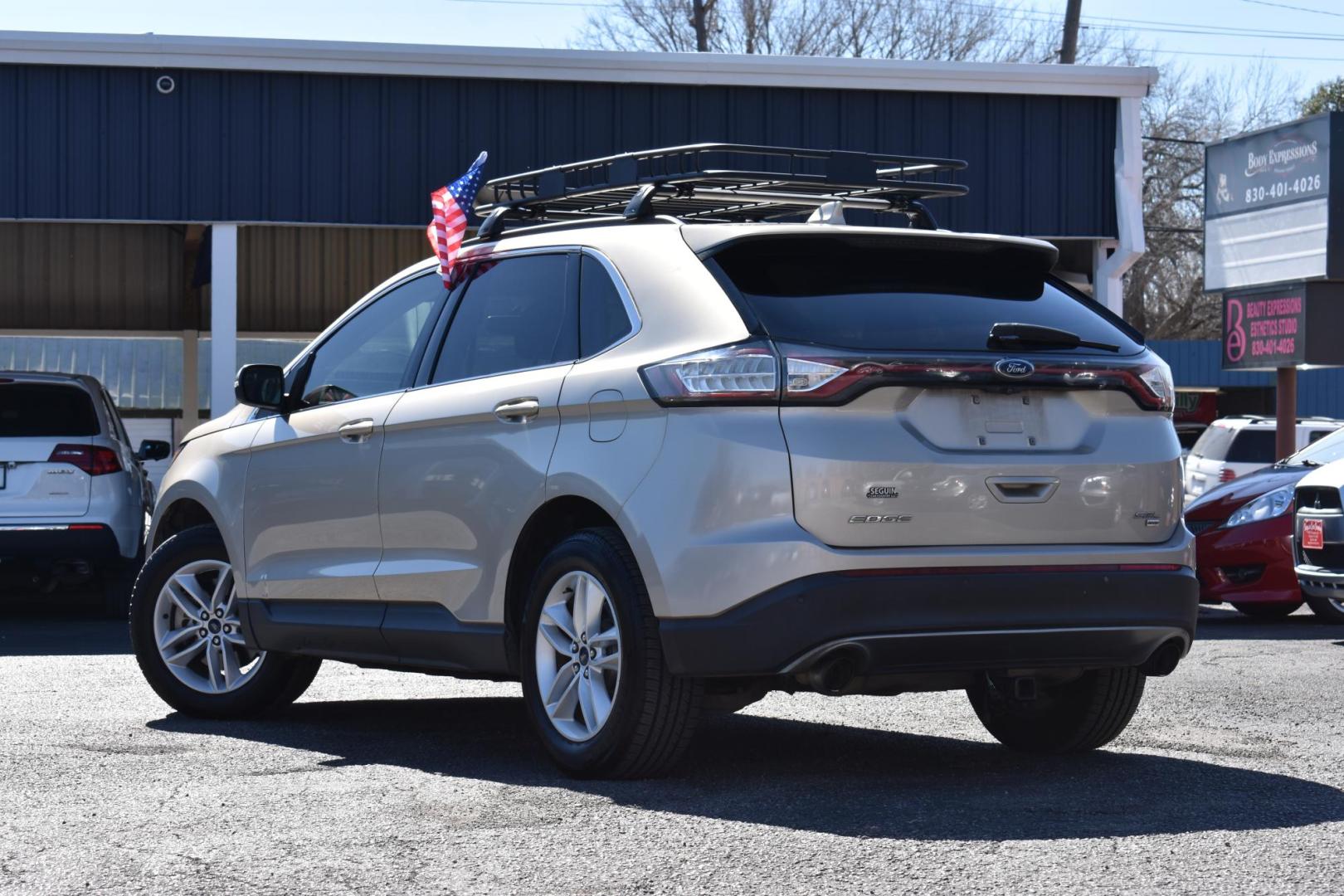 2017 TAN Ford Edge SEL AWD (2FMPK4J82HB) with an 3.5L V6 DOHC 24V engine, 6A transmission, located at 420 E. Kingsbury St., Seguin, TX, 78155, (830) 401-0495, 29.581060, -97.961647 - Photo#1