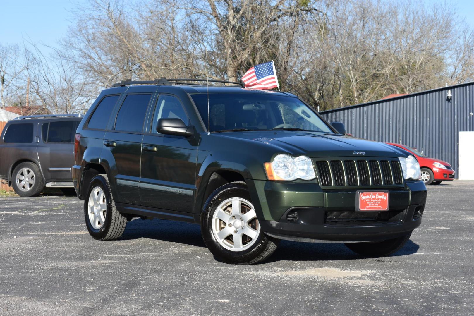 2009 GREEN Jeep Grand Cherokee Laredo 2WD (1J8GS48K19C) with an 3.7L V6 SOHC 12V engine, 5-Speed Automatic transmission, located at 420 E. Kingsbury St., Seguin, TX, 78155, (830) 401-0495, 29.581060, -97.961647 - Photo#1