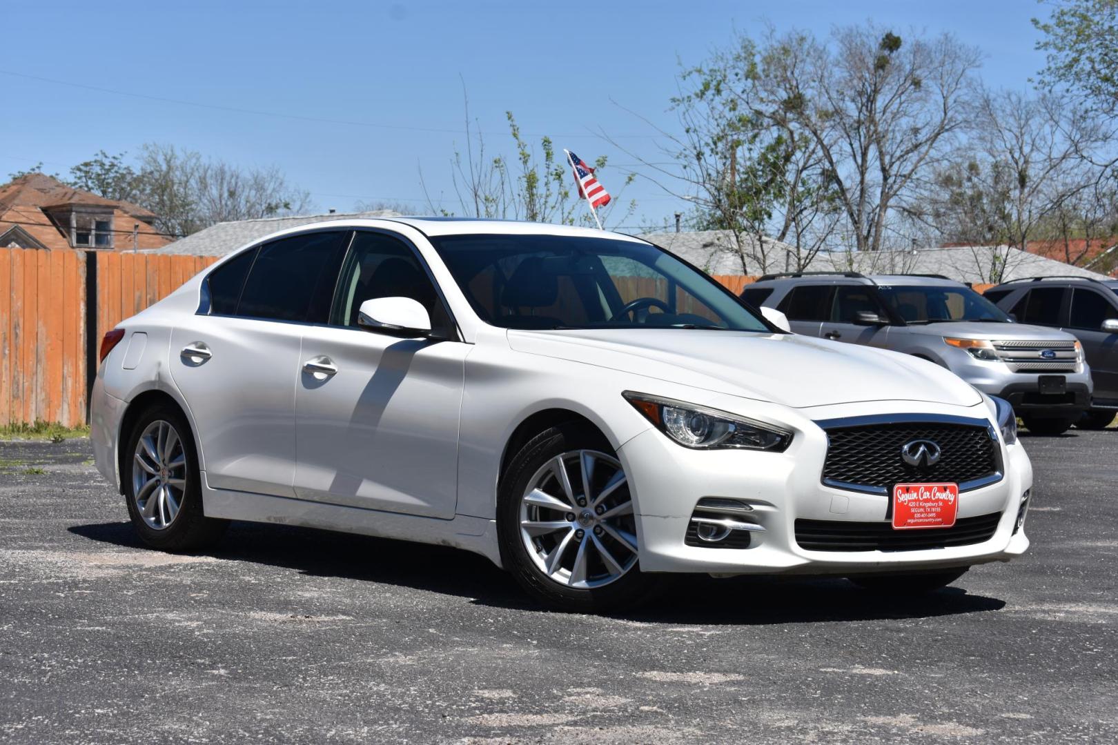 2014 WHITE Infiniti Q50 Premium (JN1BV7AP8EM) with an 3.7L V6 DOHC 24V HYBRID engine, 7-Speed Automatic transmission, located at 420 E. Kingsbury St., Seguin, TX, 78155, (830) 401-0495, 29.581060, -97.961647 - Photo#1