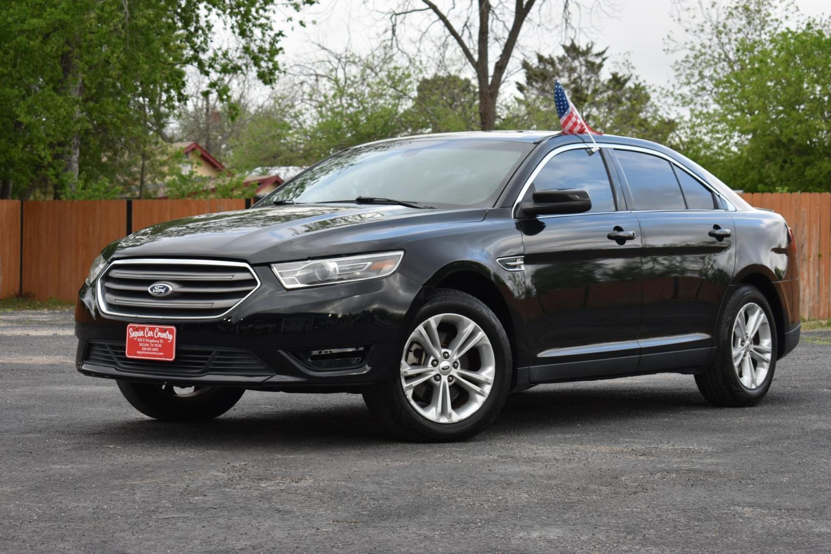 2015 BLACK Ford Taurus SEL FWD (1FAHP2E87FG) with an 3.5L V6 DOHC 24V engine, 6-Speed Automatic transmission, located at 420 E. Kingsbury St., Seguin, TX, 78155, (830) 401-0495, 29.581060, -97.961647 - Photo#3